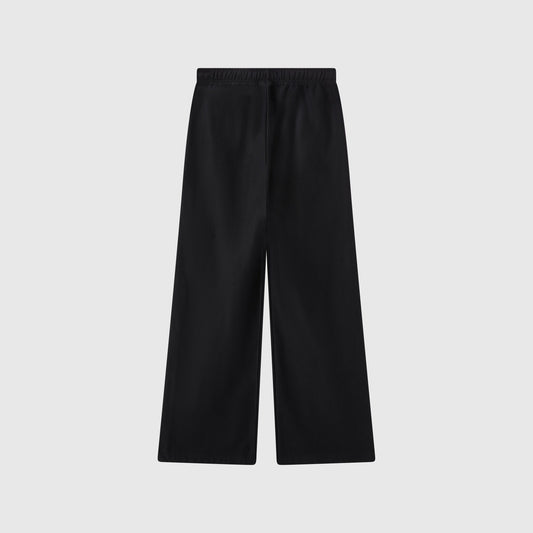 Champion Women’s Knitted Wide Leg Pants with an elastic waistband, shown laid flat on a plain light grey background. These pants feature a simple, minimalist design with no visible pockets or extra details.