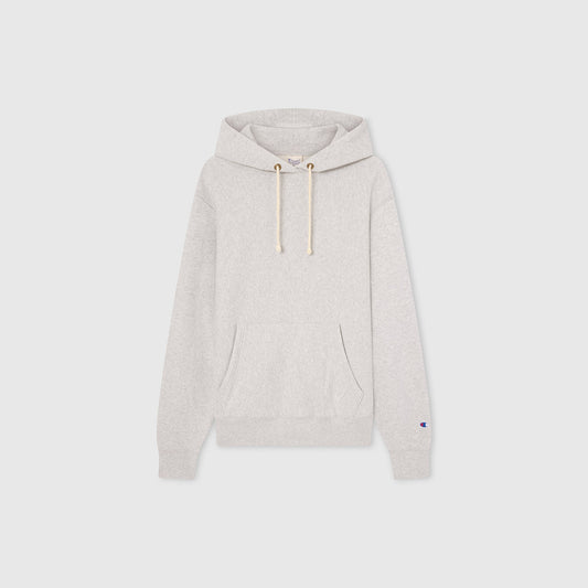 Men’s Knitted Hooded Sweatshirt by Champion in light gray, showcasing a classic Reverse Weave design with a front pouch pocket, drawstring hood, and long sleeves, presented against a plain white background.