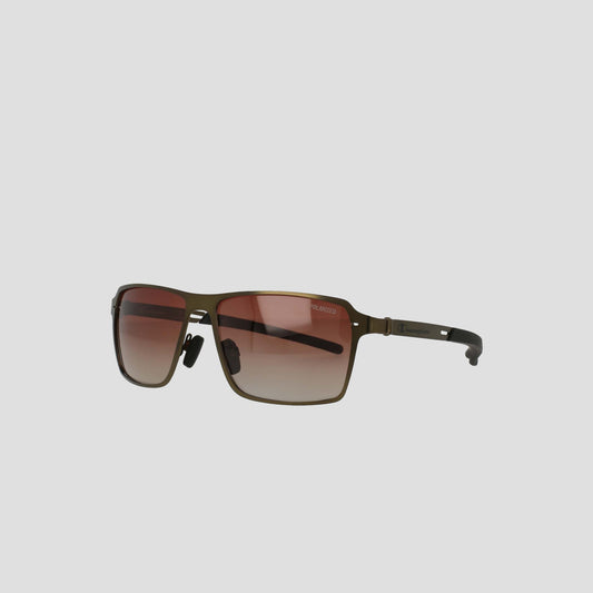 Champion Men's Polarized Stainless ST-Shirtl Comfort Fit sunglasses feature a rectangular stainless steel frame in metallic bronze, brown-tinted polarized lenses, and adjustable rubber tips for comfort, shown on a plain light gray background.