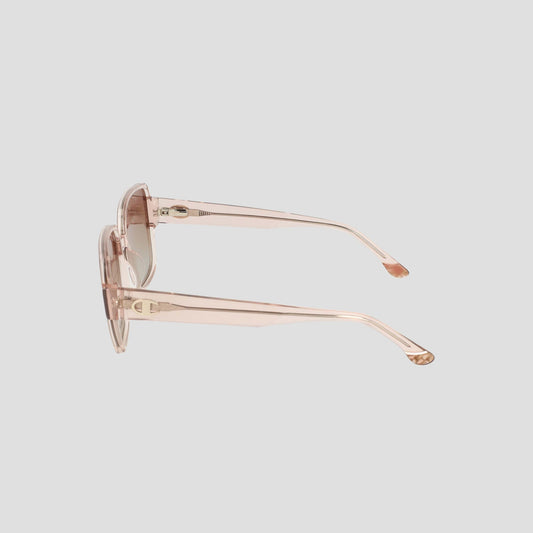 Side view of Champion Women's Polarized Glam Square sunglasses—translucent pale pink, oversized square handmade acetate frames with tapered arms—set against a plain light grey background.