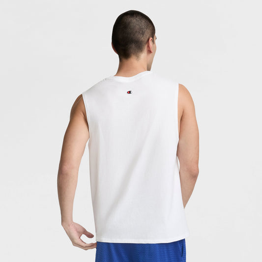 A man with short dark hair, viewed from behind, wears a white Champion Muscle Tank with a small C Logo near the neck and blue athletic shorts against a plain white background.