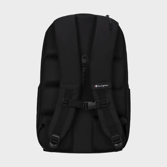 The Champion Summit Backpack is displayed from the back against a plain light gray background, highlighting its contoured strap system with padded, adjustable shoulder straps, a chest buckle, and mesh padding. One strap features a small Champion logo tag. Designed for functionality, the Summit Backpack also includes a padded laptop sleeve to keep your device secure.