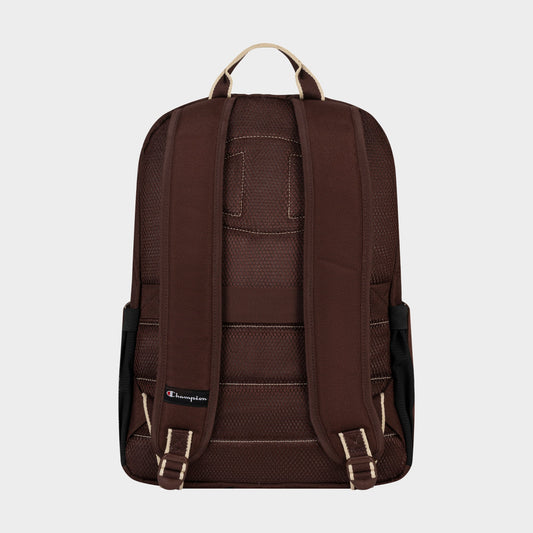 A back view of the Champion Level Backpack in brown showcases its padded shoulder straps, beige carrying handle, a small Champion logo near the bottom left strap, and a padded laptop sleeve for organized and protected everyday essentials.