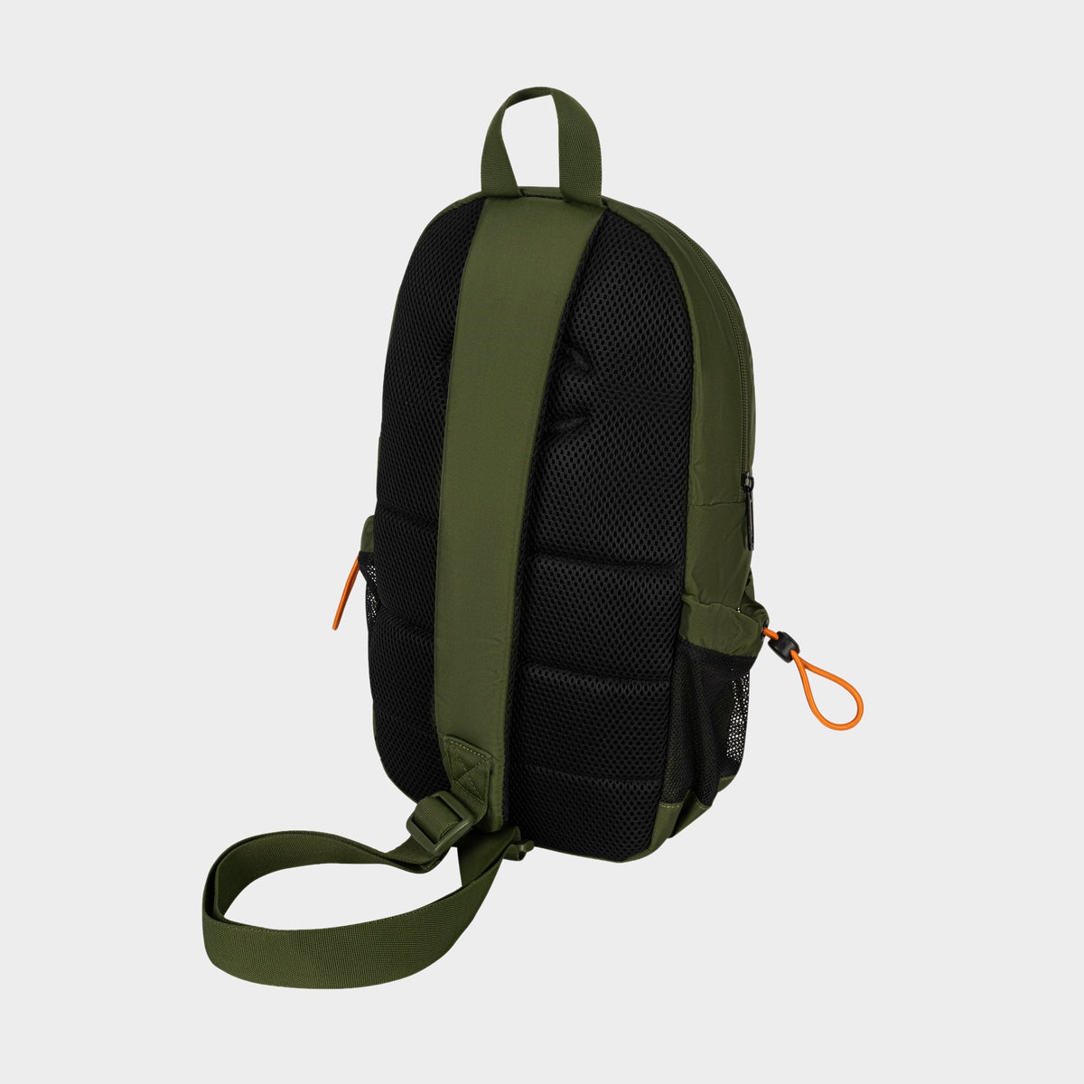 A Champion Camden Sling backpack in green and black is displayed from the back, highlighting padded straps, a single adjustable strap, and distinctive orange zipper pulls. Made from durable nylon, this sling bag is set against a light gray background.
