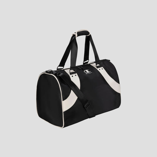 The Oracle Duffel Bag by Champion is a sleek black sports bag with white accents, featuring both a shoulder strap and handles. Set against a gray background, this stylish duffel displays the iconic Champion logo on the side, making it ideal for gym sessions or travel.