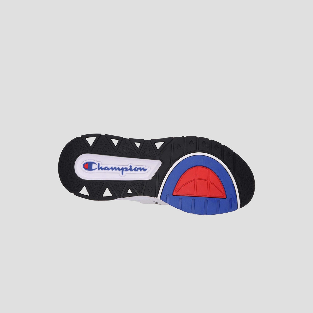 The Kids' Rally Pro by Champion features a high-top sneaker sole with black tread, a white section displaying the Champion logo in blue and red, and a red and blue curved design near the heel.
