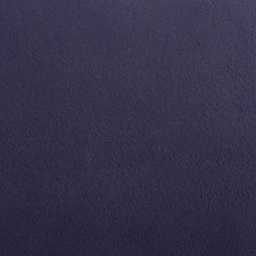 A close-up view of the Champion Faux Wool Body Pillow by Champion, showcasing its dark blue, textured faux wool surface with a soft matte finish—evoking the cozy comfort of a lounge pillow—with no distinct patterns or objects visible.
