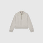 Light gray Women’s Knitted Half Zip Sweatshirt by Champion, featuring long sleeves, a cropped half-zip collar, and ribbed cuffs and hem, displayed on a plain white background—a modern essential in women’s sportswear.
