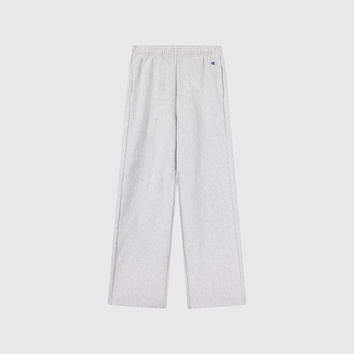 Light gray Women’s Knitted Flare Pants by Champion, crafted from heavyweight fleece with an elastic waistband, straight legs, and a small logo on the left hip. These Champion pants are laid flat on a plain white background.