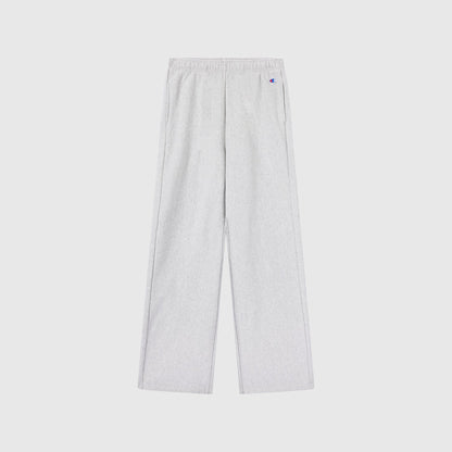 Light gray Women’s Knitted Flare Pants by Champion, crafted from heavyweight fleece with an elastic waistband, straight legs, and a small logo on the left hip. These Champion pants are laid flat on a plain white background.
