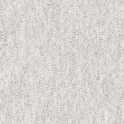 Close-up of a light gray, textured fabric surface with a soft and slightly fuzzy appearance, reminiscent of the heavyweight fleece used in the Champion Women’s Icon Hooded Full Zip Sweatshirt.