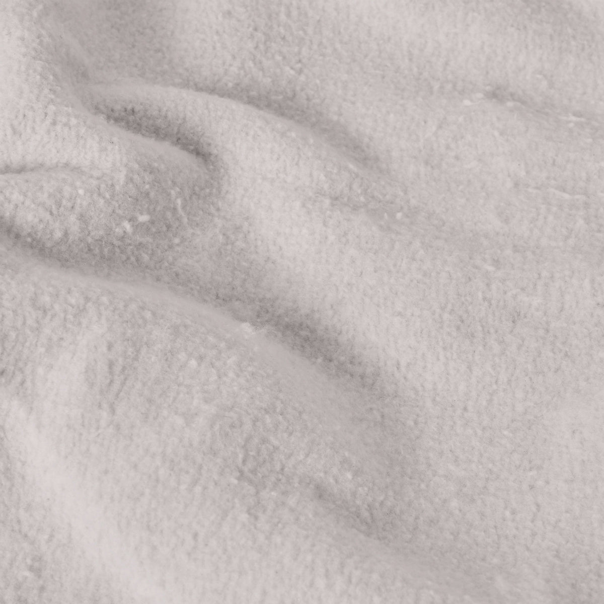 Close-up of soft, fuzzy light gray fabric from Women’s Knitted Wide Leg Pants by Champion.