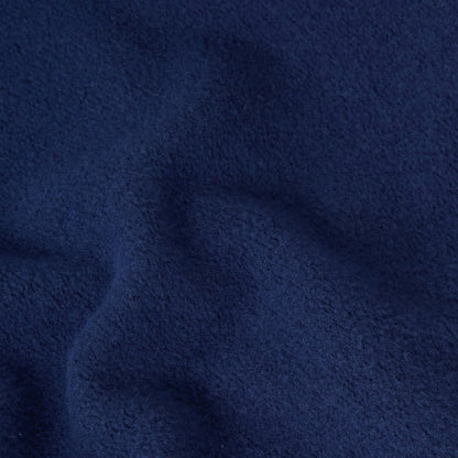 Close-up of dark blue textured fabric from the Champion Men’s Knitted Hooded Sweatshirt, featuring a soft, fuzzy surface and gentle folds that create subtle shadows and highlights.