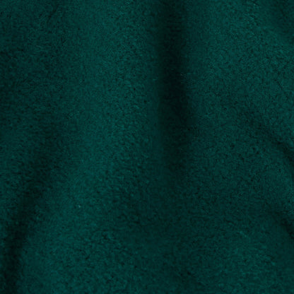 Close-up of a textured, dark green fabric with a soft, uneven surface and visible fibers, evoking a cozy and warm look—much like the plush comfort of Champion Men’s Knitted Elastic Cuff Pants.