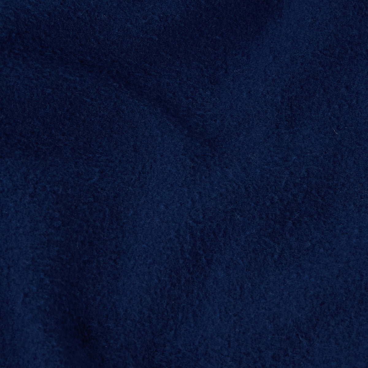 Close-up of dark blue textured fabric from the Men’s Knitted Hooded Sweatshirt (Embroidered Logo) by Champion, featuring a soft, slightly uneven surface with visible fibers and folds—characteristic of heavyweight fleece material found in premium Champion apparel.