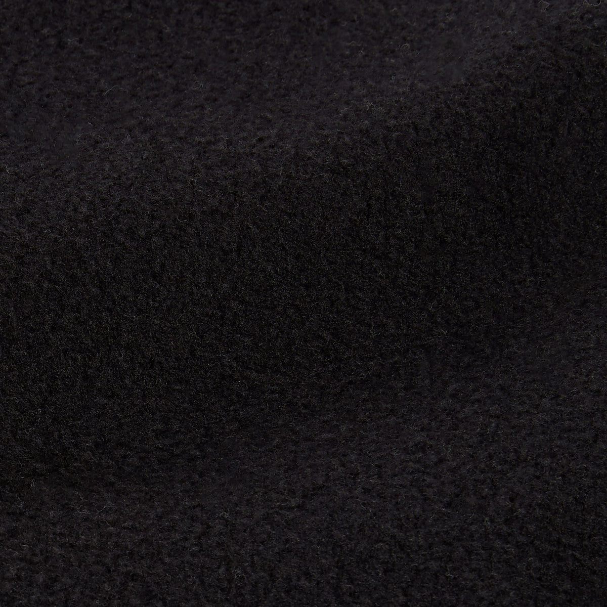 A close-up of a textured, dark, fuzzy fabric—displaying the soft and slightly uneven surface of the Champion Men’s Knitted Half Zip Sweatshirt—with gentle folds and subtle shadows, evoking a sense of coziness.