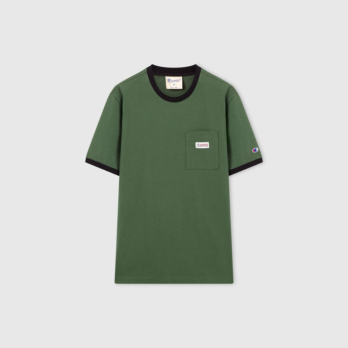 The Champion Men’s Knitted Ringer T-Shirt in green features a black collar and sleeve trim, front chest pocket, and a small Champion logo on the sleeve. Made from 100% cotton heavyweight fabric, this t-shirt is displayed laid flat on a light gray background.