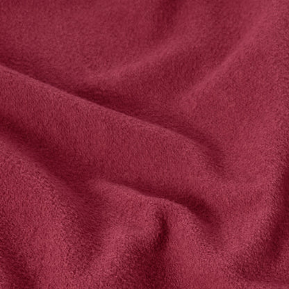 Soft, textured deep red fabric with gentle folds and subtle shadows evokes the cozy, plush feel of a vintage wash—reminiscent of the iconic Champion Men’s Knitted Crewneck Sweatshirt (Reversible + Vintage Wash).