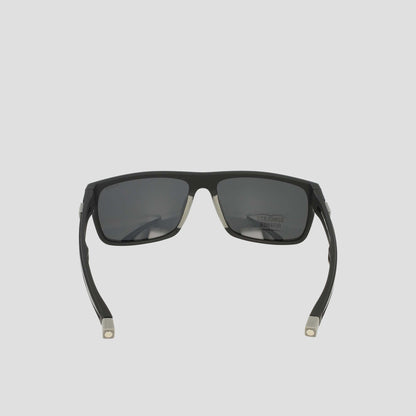 Champion Men's Polarized Wrap - Large sunglasses in black, featuring a sustainable design with a rectangular frame and temple arms, viewed from the back to reveal the inside details, set against a plain light gray background.
