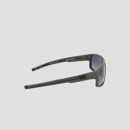 A side view of the Champion Men's Polarized Rectangle Retainer Wrap - Medium sunglasses in black, featuring thick arms and slightly curved polarized lenses, displayed against a plain light background.