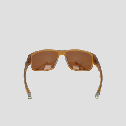 Men's Polarized Rectangle Retainer Wrap - Medium sunglasses by Champion shown from the back, featuring brown polarized lenses and wide arms, positioned against a plain light grey background.