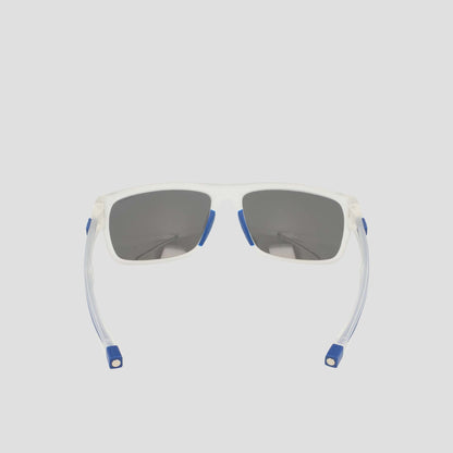 Champion Men's Polarized Wrap - Large sunglasses featuring sustainable white frames with dark polarized lenses, blue accents on the corners and nose pads, and flexible clear arms finished with blue tips, displayed on a light gray background.