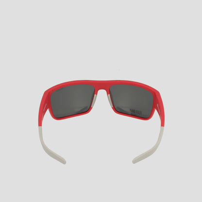 Champion Men’s Polarized Grilamid Flex Grip Tip - Large sunglasses with red frames, dark polarized lenses, and lightweight white arms. Displayed with open arms facing forward on a light gray background.