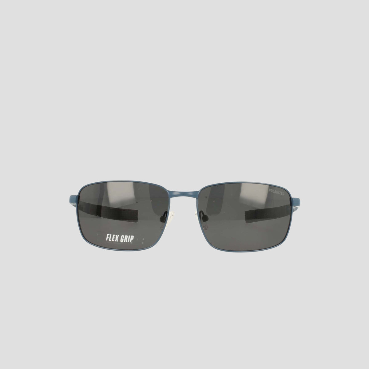 Front view of Champion Men's Polarized Stainless ST-Shirtl Flex Grip Tip sunglasses featuring dark polarized lenses, a blue frame, and “FLEX GRIP” text visible on the left lens—ideal for active lifestyles and designed with a men's retainer frame for secure comfort.