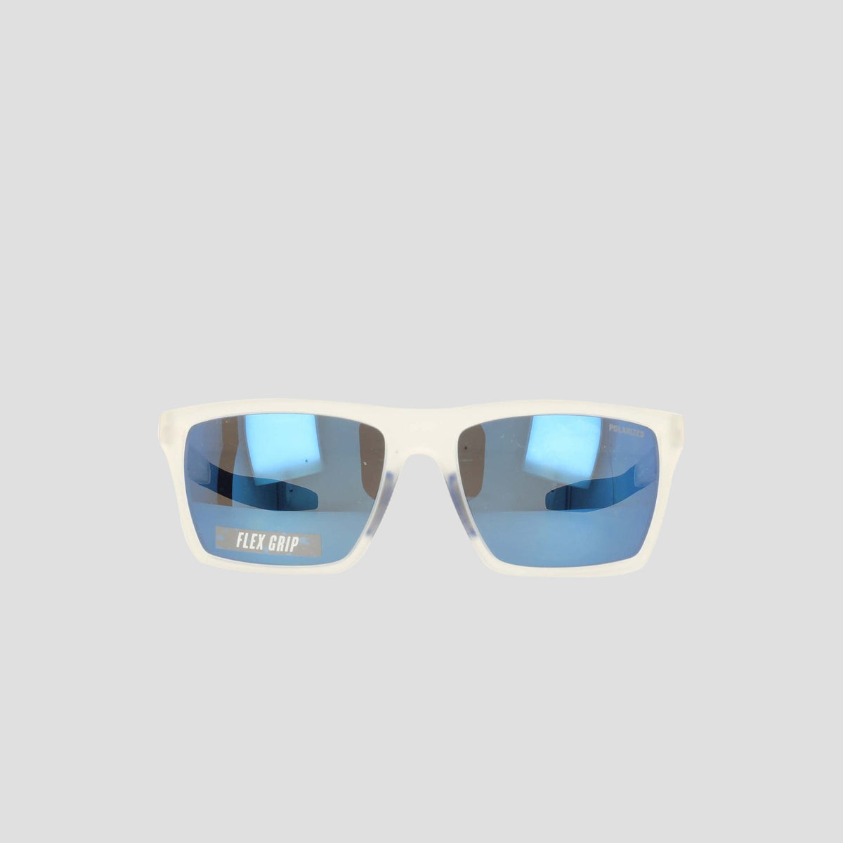 Men's Polarized Grilamid Flex Grip Tip sunglasses by Champion, featuring white rims and blue-tinted lenses, are photographed against a plain light gray background. Crafted from lightweight TR90 Grilamid material for all-day comfort, these stylish medium-fit sunglasses feature a FLEX GRIP label on the inside of the left lens.