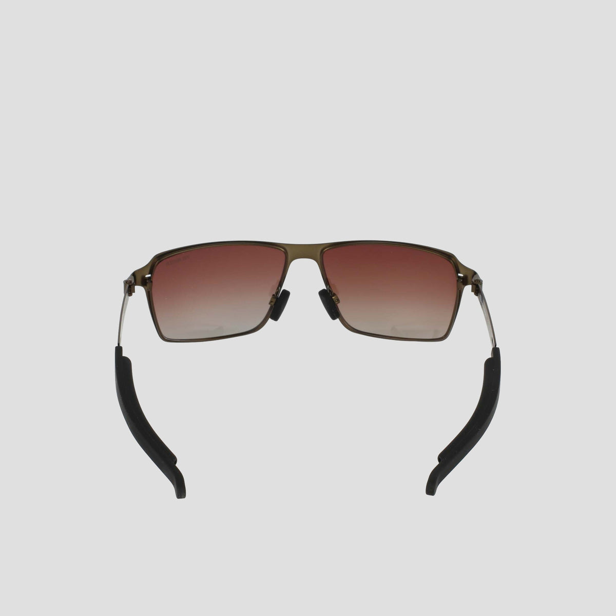 The Champion Men's Polarized Stainless ST-Shirtl Comfort Fit features square sunglasses with a gold stainless steel frame, red gradient lenses, and black curved earpieces with adjustable rubber tips, shown on a plain light gray background.