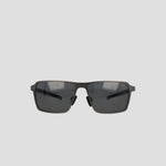 Champion Men’s Polarized Sunglasses feature dark lenses and a slim, dark stainless steel frame, displayed against a plain light grey background.