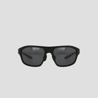 Champion Men's Polarized Comfort Fit - Large sports sunglasses, featuring a black, slightly curved TR90 frame with polarized lenses. The design includes adjustable rubber tips for enhanced comfort and a secure fit, displayed against a plain, light gray background.