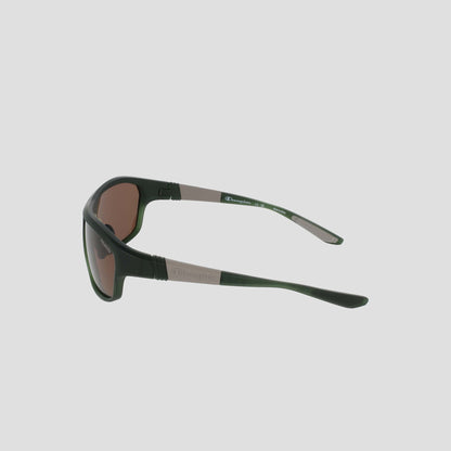 Side view of a pair of Champion Men's Polarized Comfort Fit - Large sunglasses in black and brown, with curved arms set against a plain light gray background. The TR90 frame showcases a small rectangular logo detail on the side, while adjustable rubber tips provide a secure and comfortable fit.