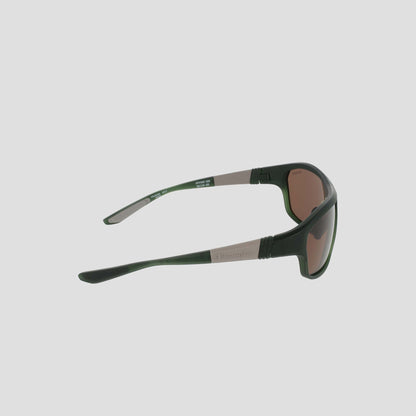 Side view of Champion Men's Polarized Comfort Fit - Large sunglasses in green and black, featuring brown-tinted polarized lenses and a lightweight TR90 frame, highlighting the left temple and hinge against a plain light background.