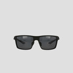 A pair of Champion Men's Polarized Comfort Fit - Medium sunglasses featuring a black rectangular design with dark lenses and a lightweight frame, displayed against a plain light gray background.