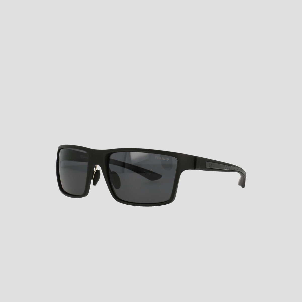 Men's Polarized Comfort Fit - Medium sunglasses by Champion, featuring a black rectangular design with dark polarized lenses and thick yet lightweight frames, displayed on a plain light gray background.