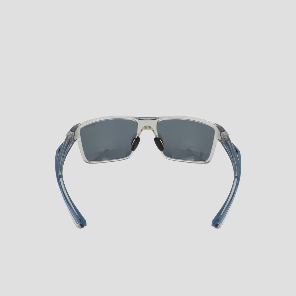 A pair of Champion Men's Polarized Comfort Fit - Medium sunglasses with a lightweight, clear frame, blue temples, and dark rectangular lenses, shown from the front with the temples open and facing outward.