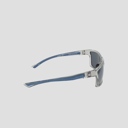 Side view of Champion Men's Polarized Comfort Fit - Medium sunglasses featuring a lightweight, translucent gray frame with blue arms and dark lenses, displayed on a light gray background.
