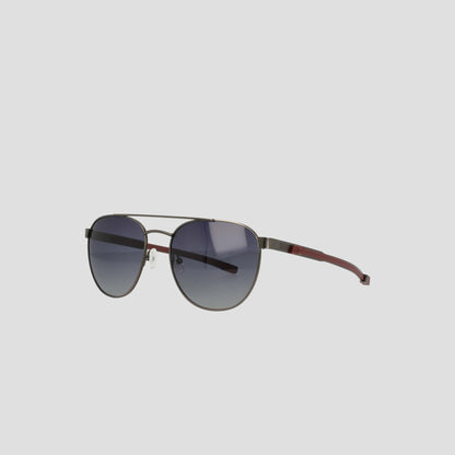 The Champion Men's Polarized Retainer Stainless ST-Shirtl Aviator sunglasses feature a thin, lightweight stainless steel frame with a double bridge, dark gradient polarized lenses, and maroon-colored arms, showcased against a light gray background.