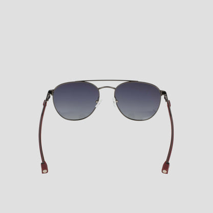 A pair of Champion Men's Polarized Retainer Stainless ST-Shirtl Aviator sunglasses, featuring dark gradient polarized lenses, thin lightweight stainless steel frames, and maroon temple tips, shown on a plain light gray background.