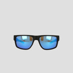 Men's Polarized Retainer Rectangle sunglasses by Champion, featuring a sleek black frame with blue mirrored, polarized lenses, are displayed against a plain light gray background. Crafted with a high-performance retainer design and durable TR90 construction, these shades subtly reflect lights and objects on their lenses.