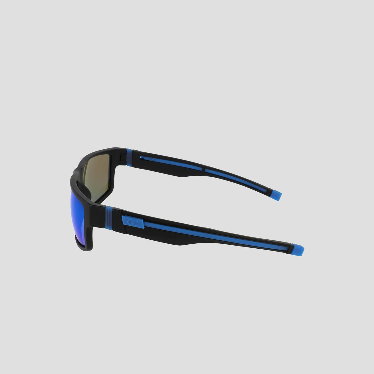 The Champion Men's Polarized Retainer Rectangle sunglasses are showcased from a side angle against a light gray background. Crafted with durable TR90 construction and polarized lenses, these shades blend high-performance features with a sporty design. The reflective blue-tinted lenses enhance the sleek black frame accented in blue for a bold, modern look.