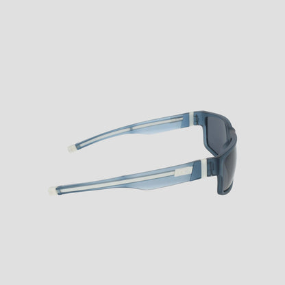 Men's Polarized Retainer Rectangle sunglasses by Champion, featuring blue translucent frames with thick, high-performance retainers and dark polarized lenses crafted from durable TR90 material, displayed from a side angle against a plain white background.