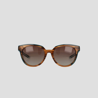 Champion Women's Polarized Retainer Round sunglasses feature brown tortoiseshell cateye frames and gradient brown lenses, designed for women’s eyewear and displayed against a plain light gray background.