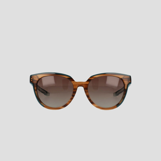 Champion Women's Polarized Retainer Round sunglasses feature brown tortoiseshell cateye frames and gradient brown lenses, designed for women’s eyewear and displayed against a plain light gray background.