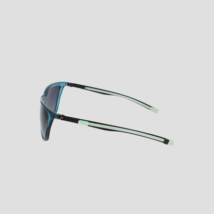 Side view of the Champion Women's Polarized Retainer Rectangle sunglasses in blue, showcasing black and light green arms, rectangular polarized lenses, and stylish light green accents at the hinges and temple tips—all set against a plain light background, making them an ideal choice for athleisure eyewear enthusiasts.