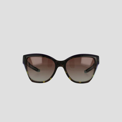 Front view of Champion Women's Polarized Retainer Square sunglasses, featuring an oversized design in handmade tortoiseshell acetate and gradient brown polarized lenses, displayed on a plain light gray background.