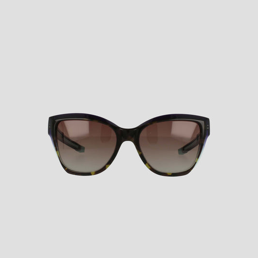 Front view of Champion Women's Polarized Retainer Square sunglasses, featuring an oversized design in handmade tortoiseshell acetate and gradient brown polarized lenses, displayed on a plain light gray background.