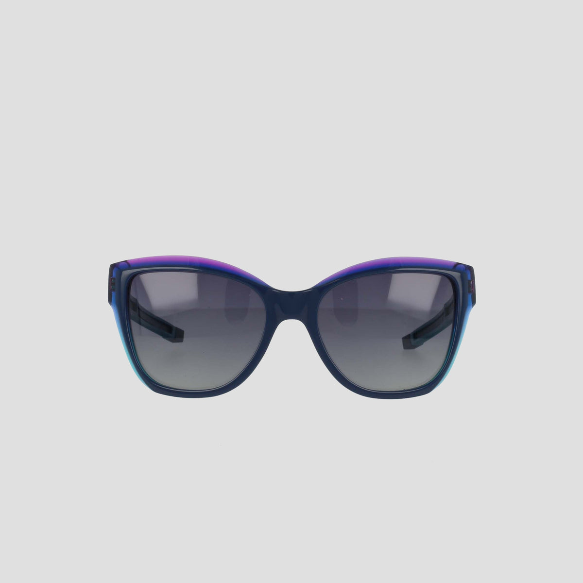 Front view of Champion Women's Polarized Retainer Square sunglasses with handmade acetate, dark polarized lenses, and a gradient blue-purple frame, displayed on a plain light gray background.