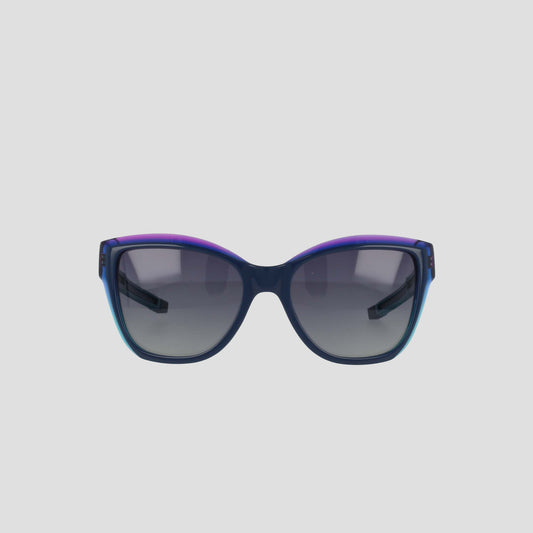 Front view of Champion Women's Polarized Retainer Square sunglasses with handmade acetate, dark polarized lenses, and a gradient blue-purple frame, displayed on a plain light gray background.